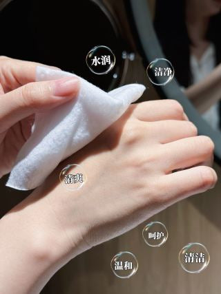 Extra-large 140x200mm size demo - wipe draped over hand showing full coverage, thick non-woven fabric