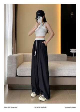 Light blue wide-leg pants detail shots