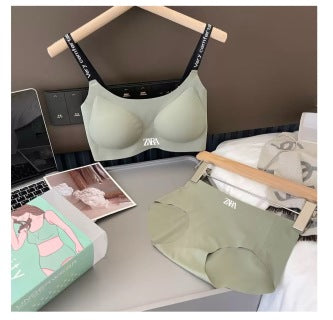 Cream bra and underwear set on model - three-quarter view showing seamless construction