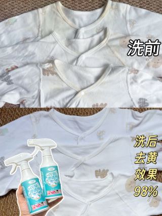 Spray applied to white garment - hand rubbing stain area showing easy application method