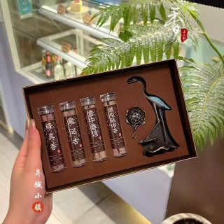 Full gift box open - crane stand, lotus pendant burner, and 4 incense tubes in brown velvet tray