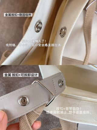 Black tote bag with mini pouch - model carrying as shoulder bag