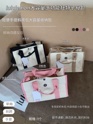 Beige canvas tote bag with matching strap - model carrying as shoulder bag