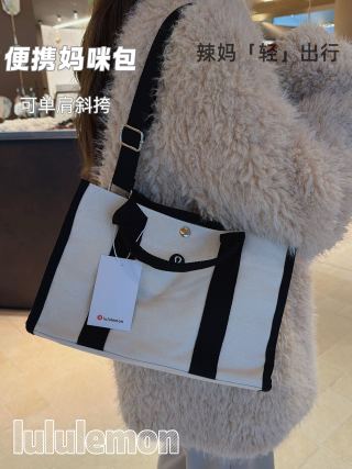 Beige tote bag open showing interior organization and depth