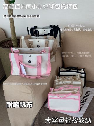 Beige tote worn as crossbody with wide adjustable strap