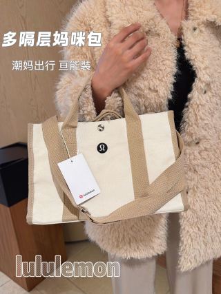 Black and white tote bags side by side showing size and capacity