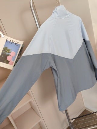 Blue jacket - model standing full length showing fit and silhouette