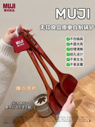 Three spatulas fanned out showing S-curve handle design and thin rounded spatula edge