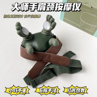 Massager on shoulder - woman using hands-free strap while sitting, showing relaxed posture during use