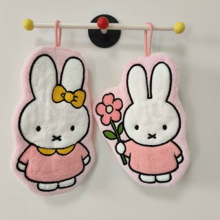 Miffy towel face close-up - embroidered X eyes, black outline, white coral fleece face