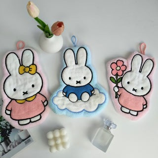 Blue Cloud Miffy towel on white plate - showing full shape, cloud base, and blue outfit