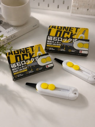 Two FUJINO cutters and two product boxes on white surface - lifestyle product shot